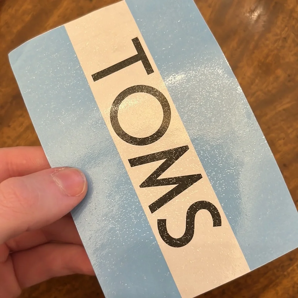 NWT TOMS Dust Cover Bag and Sticker